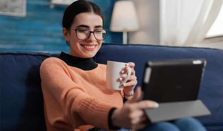 Woman watching videos on her cell phone