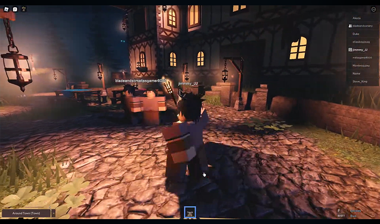 Character from the game Kingdom Life II in a village with several buildings at night.